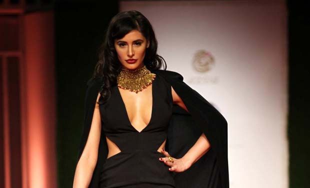 Photos and video: Nargis Fakhri suffers Wardrobe Malfunction at Indian Bridal Fashion Week