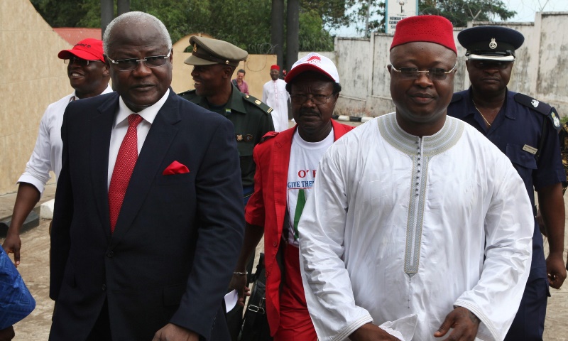 Sierra Leone's president Ernest Bai Koroma (L) and vice president Samuel Sam Sumana arrive at the National Electoral Commission in Freetown October 11, 2012. Koroma and Sumana signed their nomination papers on Thursday in advance of next month's presidential election on November 17. REUTERS/Simon Akam (SIERRA LEONE - Tags: POLITICS ELECTIONS) - RTR39153