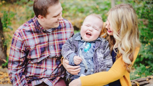 Jake and Natalie Peterson and their son Garrett in October 2014