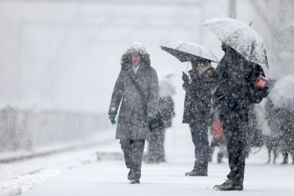 Forecasted snowstorms in parts of the U.S. intensify debate on the occurrence of global warming